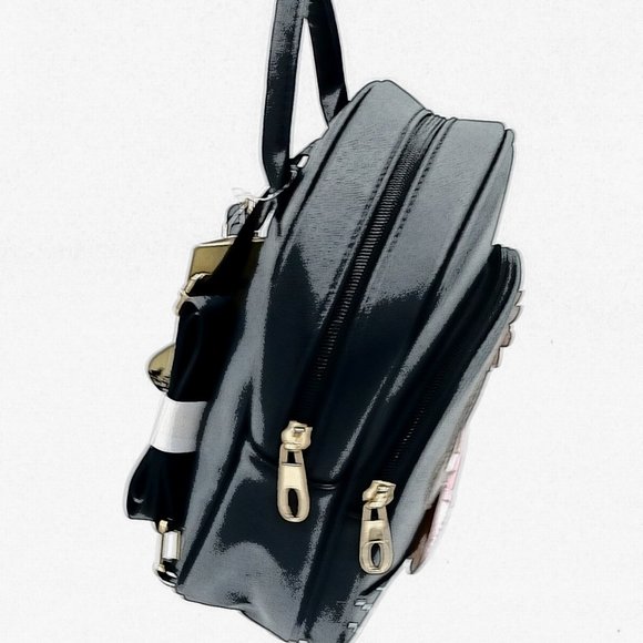 A black back pack mixed with a hint of pink making the perfect blend. - Picture 5 of 8